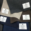 Material de lana marrón de franela suave de alta calidad que se adapta a la acción de la super 100 de la tela
